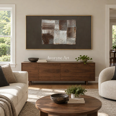 Hushed Refrain neutral geometric relief wall art with a gold frame hanging in a living room