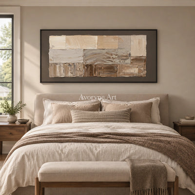 Hushed Interval neutral geometric relief wall art with a black frame above a bed in a bedroom