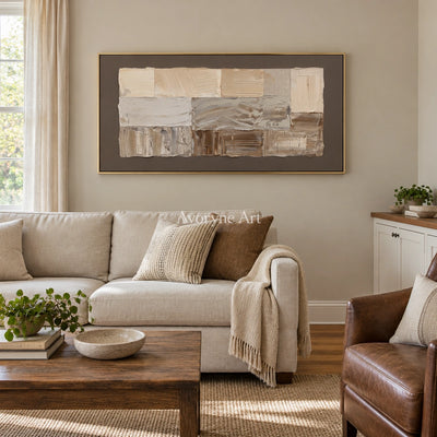 Hushed Interval neutral geometric relief wall art with a gold frame hanging in a living room