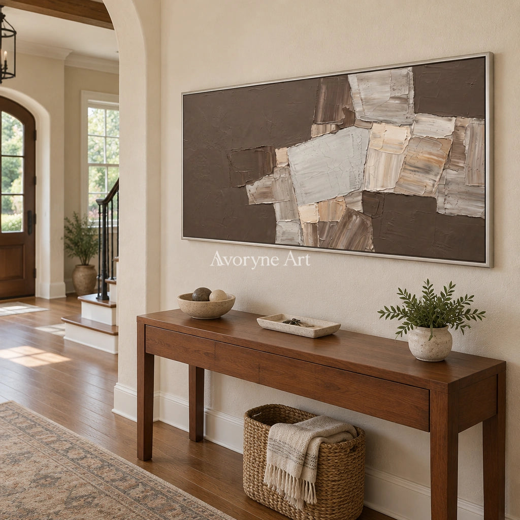 Hushed Sonata neutral geometric relief wall art with a silver frame in an entryway