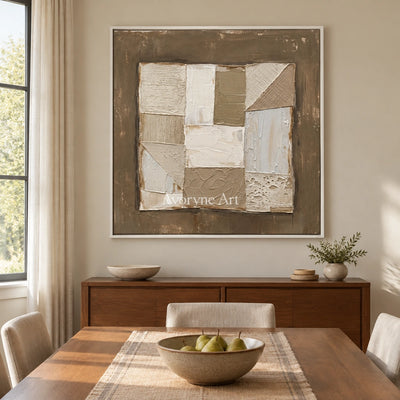 Mineral Echo neutral geometric relief wall art with a white frame in a dining room