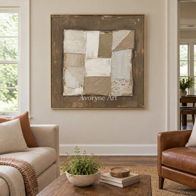 Mineral Echo neutral geometric relief wall art with a gold frame hanging in a living room