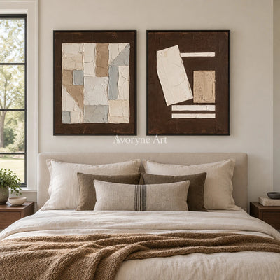 Mineral Rhythm neutral geometric relief diptych with a black frame above a bed in a bedroom