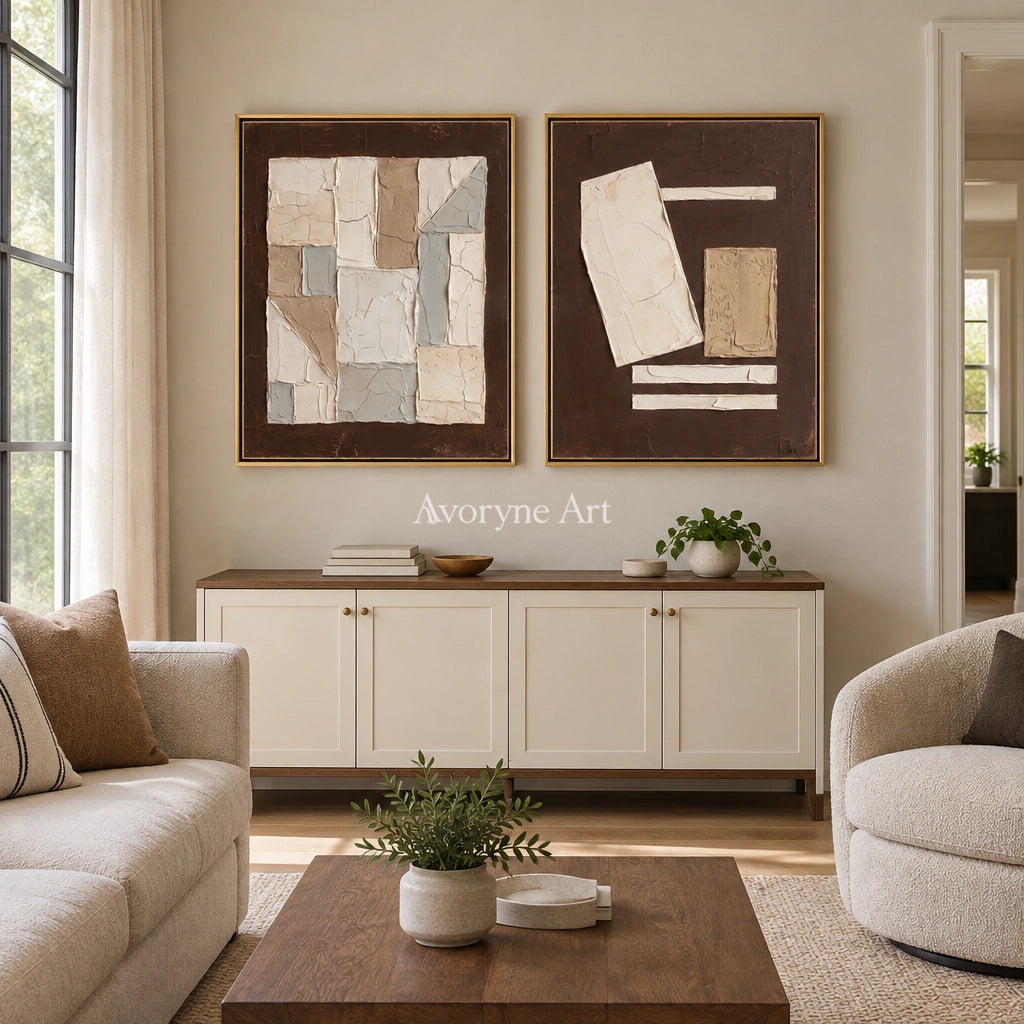 Mineral Rhythm neutral geometric relief diptych with a gold frame hanging in a living room
