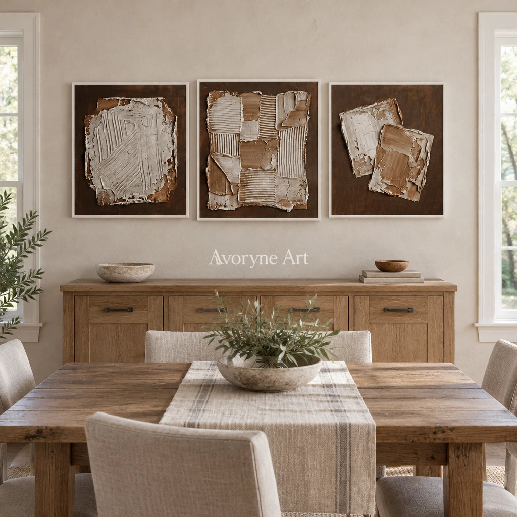 Soft Sonata neutral geometric relief triptych with a white frame in a dining room