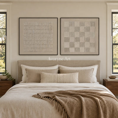 Muted Reverie neutral grid art diptych with a black frame above a bed in a bedroom