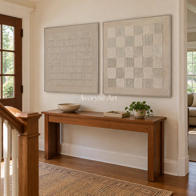 Muted Reverie neutral grid art diptych with a silver frame in an entryway