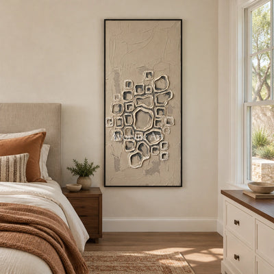 Weathered Interval neutral grid texture wall art with a black frame above a bed in a bedroom