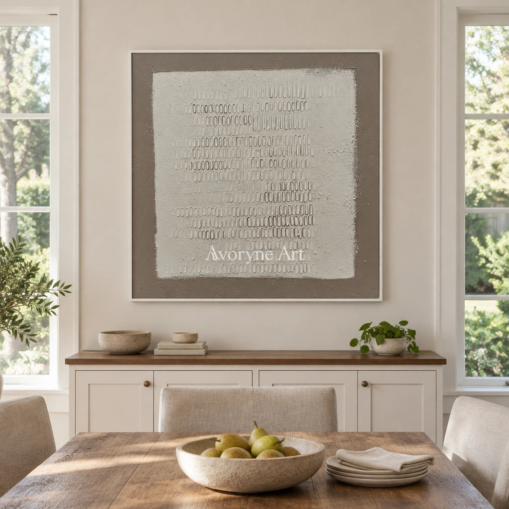 Woven Solace neutral grid texture wall art with a white frame in a dining room