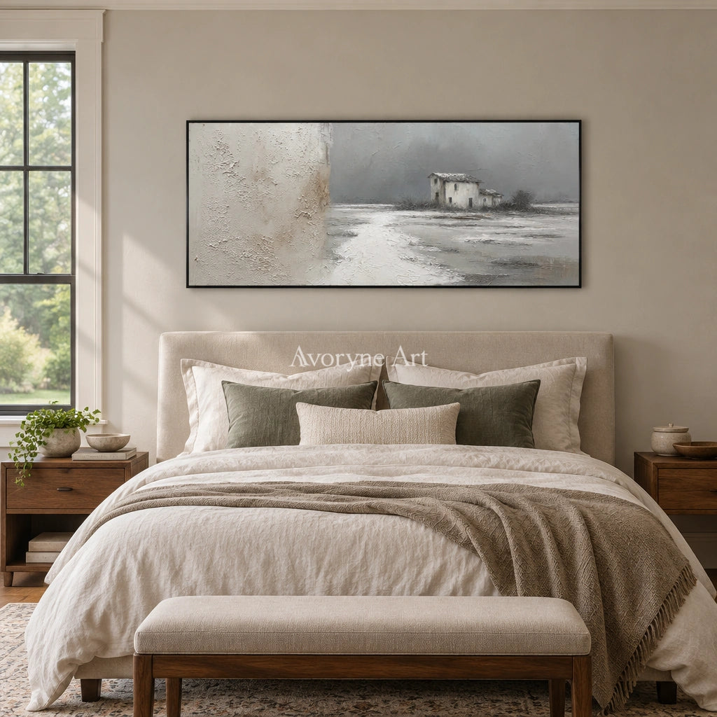 Quiet Sonata neutral house landscape wall art with a black frame above a bed in a bedroom