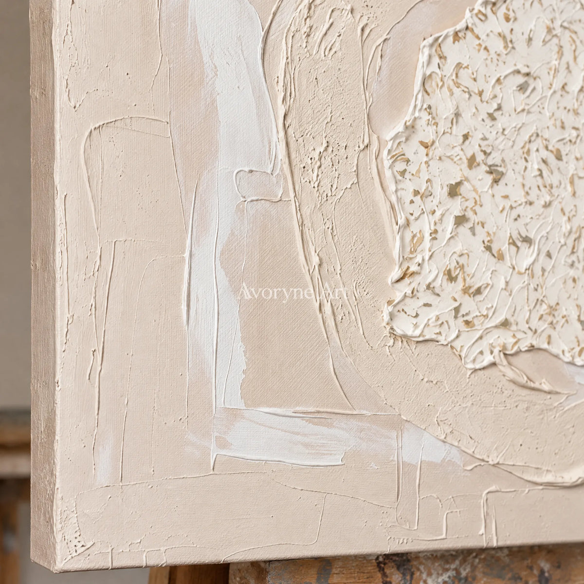 Close-up of the hand-painted texture of Misted Field neutral layered relief wall art on an easel