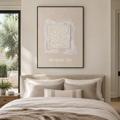 Weathered Refrain neutral layered relief wall art with a black frame above a bed in a bedroom