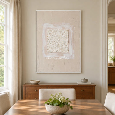 Weathered Refrain neutral layered relief wall art with a white frame in a dining room