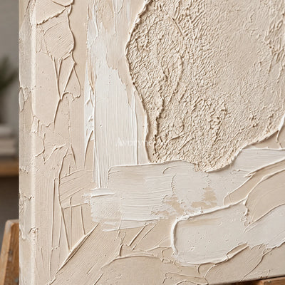 Close-up of the hand-painted texture of Weathered Trace neutral layered relief wall art on an easel