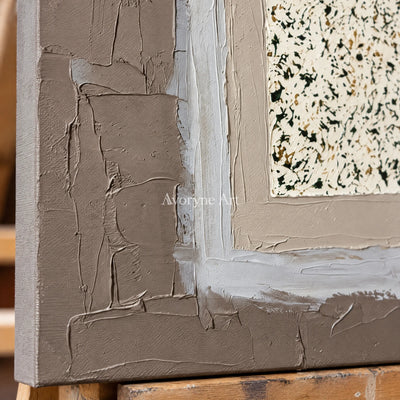 Close-up of the hand-painted texture of Weathered Drift neutral layered relief wall art on an easel