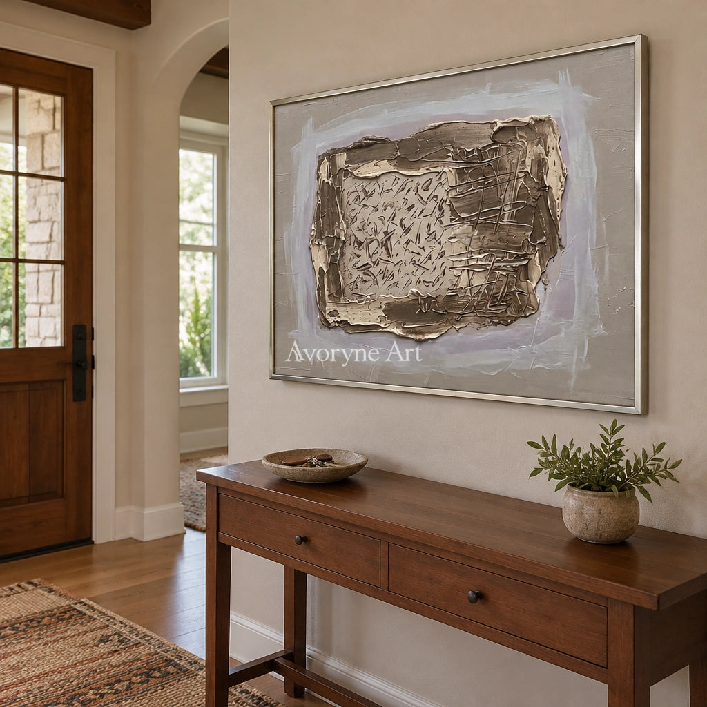 Weathered Reverie neutral layered relief wall art with a silver frame in an entryway