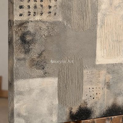 Close-up of the hand-painted texture of Woven Field neutral mineral texture wall art on an easel