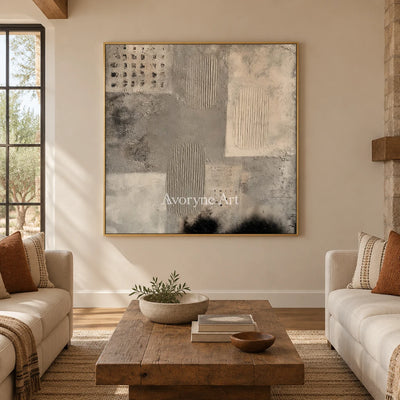 Woven Field neutral mineral texture wall art with a gold frame hanging in a living room