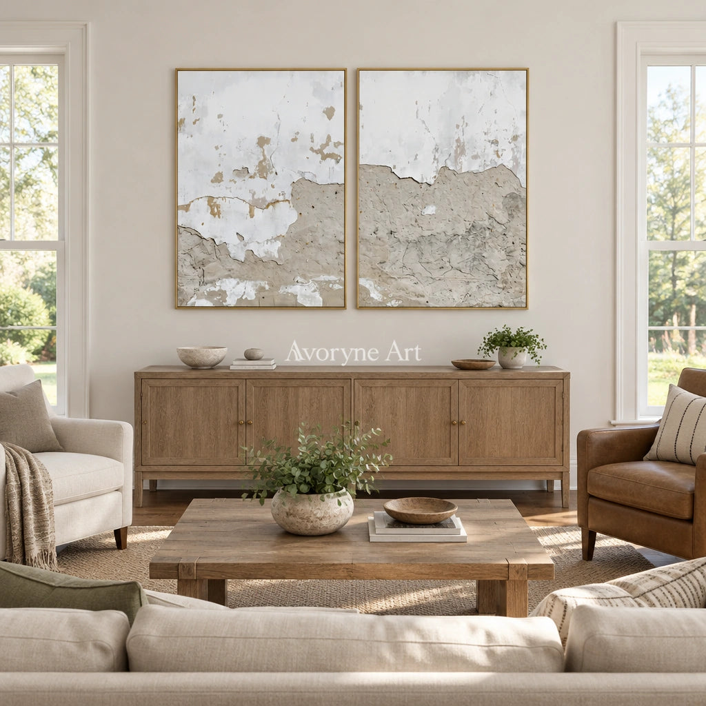 Muted Solace neutral mineral texture diptych with a gold frame hanging in a living room