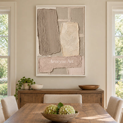 Weathered Haven neutral patch relief wall art with a white frame in a dining room