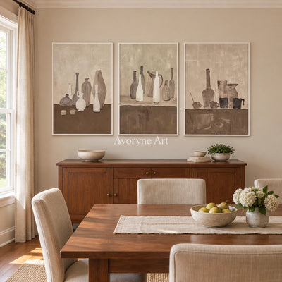 Muted Verse neutral pottery art triptych with a white frame in a dining room