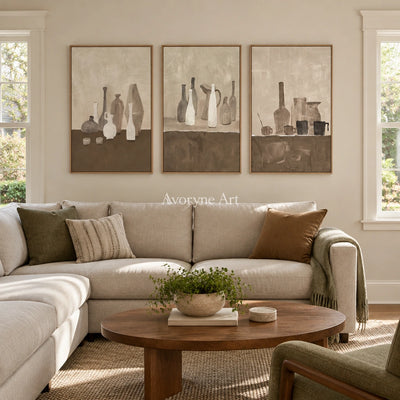 Muted Verse neutral pottery art triptych with a wood frame in a villa living space