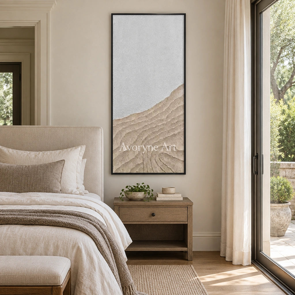 Muted Echo neutral ridge texture wall art with a black frame above a bed in a bedroom