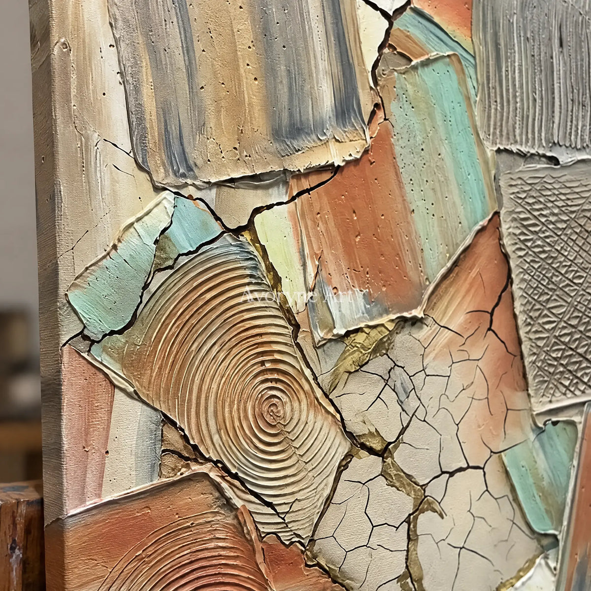 Close-up of the hand-painted texture of Still Haven neutral texture mosaic wall art on an easel