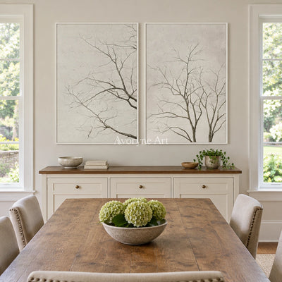 Muted Drift neutral tree texture diptych with a white frame in a dining room