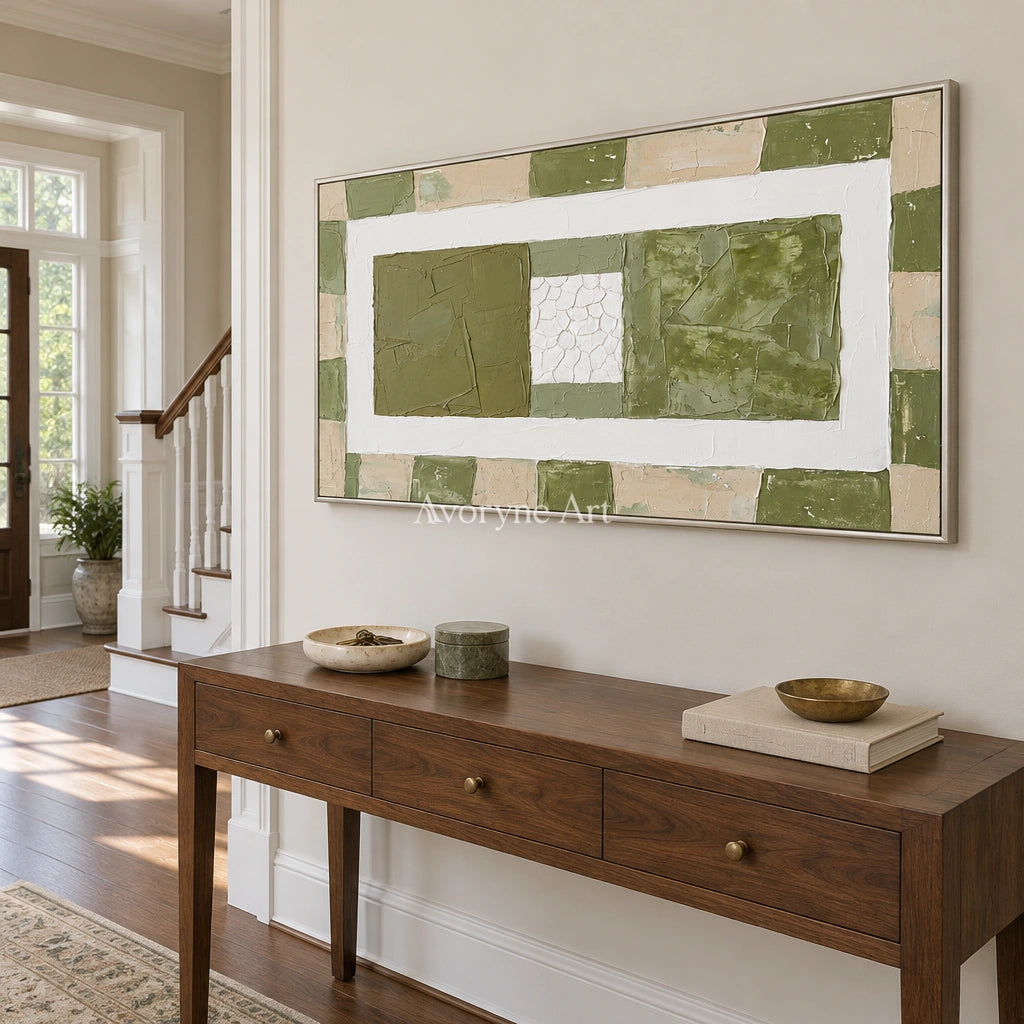 Soft Measure olive ivory grid wall art with a silver frame in an entryway