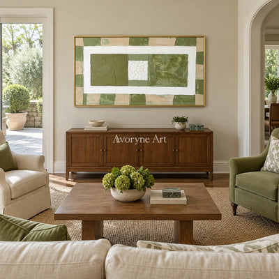 Soft Measure olive ivory grid wall art with a gold frame hanging in a living room