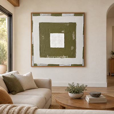 Hushed Drift olive ivory grid wall art with a wood frame in a villa living space