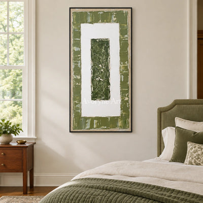Mineral Haven olive ivory grid wall art with a black frame above a bed in a bedroom