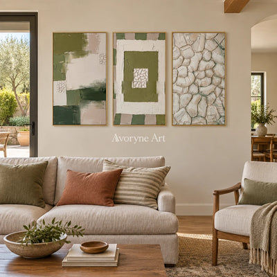 Hushed Cadence olive ivory grid triptych with a gold frame hanging in a living room