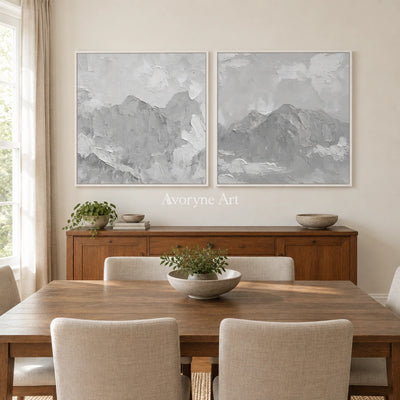 Muted Memory pale mountain relief diptych with a white frame in a dining room
