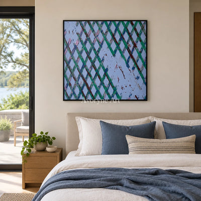 Earthen Haven pastel grid texture wall art with a black frame above a bed in a bedroom
