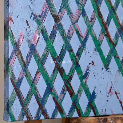 Close-up of the hand-painted texture of Earthen Haven pastel grid texture wall art on an easel