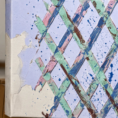 Close-up of the hand-painted texture of Earthen Rhythm pastel grid texture wall art on an easel