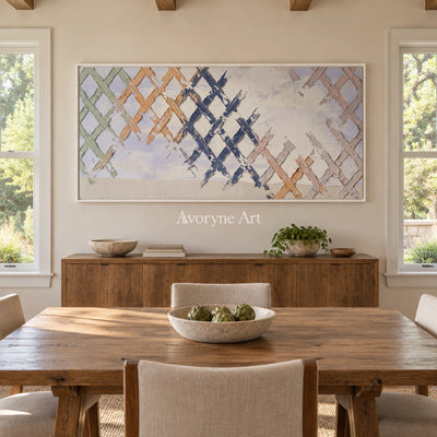 Earthen Memory pastel grid texture wall art with a white frame in a dining room