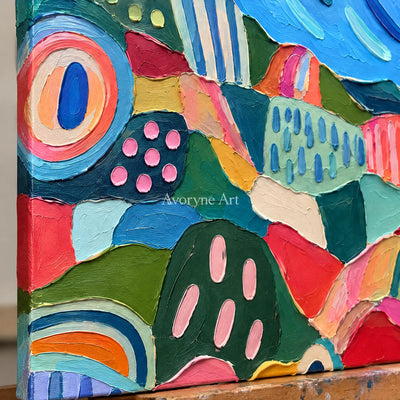 Close-up of the hand-painted texture of Amber Prelude patterned field wall art on an easel