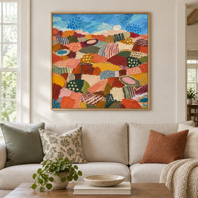 Amber Vista patterned field wall art with a wood frame in a villa living space
