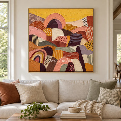 Amber Solace patterned field wall art with a gold frame hanging in a living room