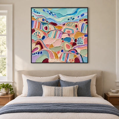 Soft Cadence patterned field wall art with a black frame above a bed in a bedroom