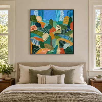 Soft Reverie patterned field wall art with a black frame above a bed in a bedroom