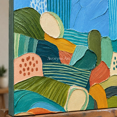 Close-up of the hand-painted texture of Soft Reverie patterned field wall art on an easel