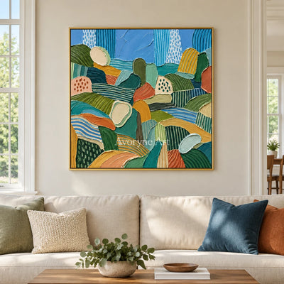 Soft Reverie patterned field wall art with a gold frame hanging in a living room