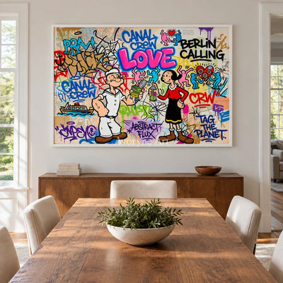 Soft Vista playful character wall art with a white frame in a dining room