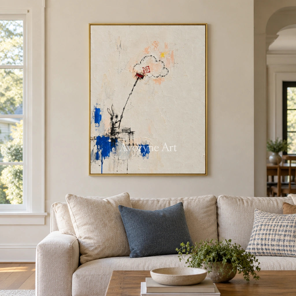 Open Drift playful character wall art with a gold frame hanging in a living room