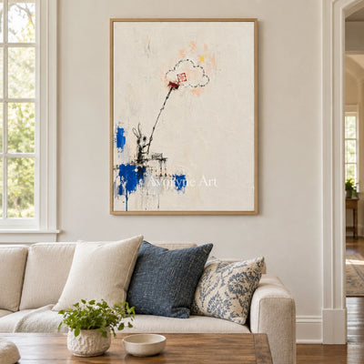 Open Drift playful character wall art with a wood frame in a villa living space