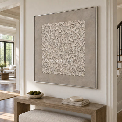 Quiet Passage relief mosaic wall art with a silver frame in an entryway